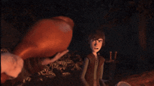 a cartoon character with horns and a helmet is holding a large red object