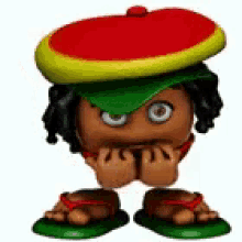 a cartoon character wearing a rasta hat and sandals is covering his face .