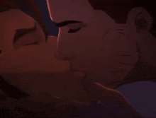 two men are kissing with their eyes closed
