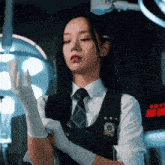 a woman wearing white gloves and a vest with a badge that says ' seoul ' on it
