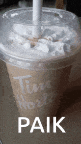 a cup of tim hortons milkshake with whipped cream