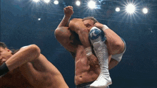 a wrestler with the letter k on his knee