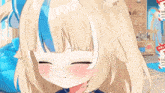 a girl with blonde hair and blue eyes is smiling and making a face .