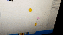 a computer screen shows a drawing of a cat with a yellow ball