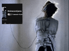 a picture of a man in a strait jacket with the words 2minecord jams on the bottom