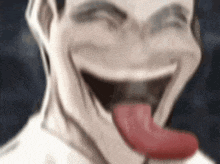 a close up of a person 's face with their tongue out .