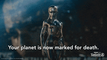 a statue of a woman with the words " your planet is now marked for death " below her