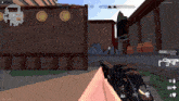 a person holding a gun in a video game with the number 100 on the bottom