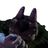a close up of a monster 's face with horns