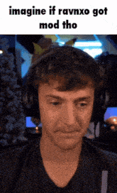 a man wearing headphones with the words imagine if ravnxo got mod tho below him
