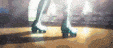 a person rollerblading on a wooden floor