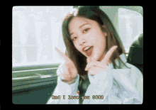 a woman giving a peace sign with the words " and i love you 3000 " underneath her
