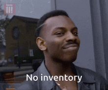 a man says " no inventory " in front of a building