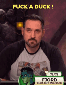 a man with a beard and a name tag that says fjord