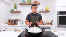a man in an apron is cooking in a kitchen with the words made in animatica on the bottom