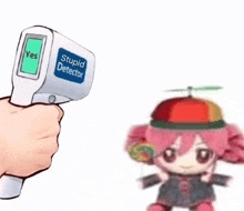 a person is holding a thermometer in front of a stuffed animal with a propeller on her head .