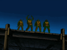 four teenage mutant ninja turtles standing on a wooden bridge