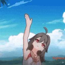 a girl in a bikini is raising her hand in the air .