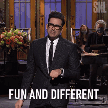 Fun And Different Dan Levy GIF