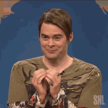 trying not to laugh stefon meyers saturday night live cover face holding back laughter