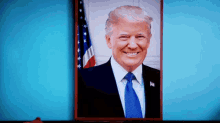 a picture of donald trump is displayed on a screen