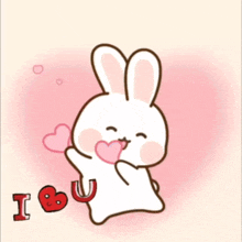 a bunny holding a heart with the words i love you
