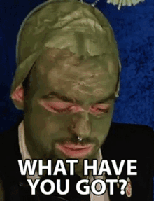 a man with a green mask on his face says what have you got