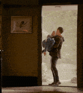 Carrying Her Over The Doorway Romantic GIF - Carrying Her Over The Doorway Romantic Enzo And Bonnie GIFs