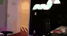 a room with a microphone and a sign on the wall that says se2 incognito
