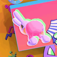 a purple bunny with a pink butt is sitting on a pink and blue item .