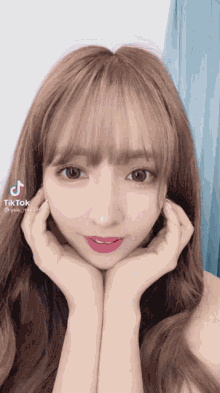 a tiktok video of a woman with long hair