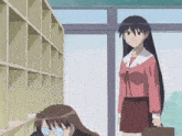 a girl in a pink shirt is standing next to a girl in glasses