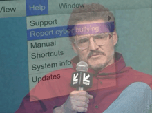 a man holding a microphone in front of a screen that says sxsw on it