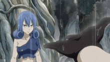 a woman with blue hair is standing in the rain