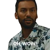 a man with a beard wearing a shirt that says oh wow