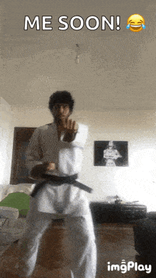 a gif of a man in a karate uniform with the caption me soon