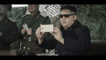 Kim Jong Un Recording GIF - Kim Jong Un Recording Phone GIFs