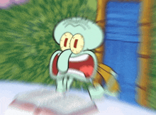 a blurry picture of squidward from spongebob squarepants covering his face with his hand
