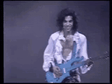Happy GIF - Prince Guitar Singer GIFs