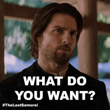 a man with long hair and a beard asks what do you want