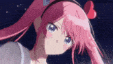 a girl with pink hair and blue eyes has a headband with a heart on it