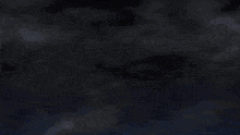 a bunch of spears are surrounded by blue fire
