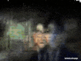 a blurred image of a person with the words lainiwakurafanpage at the top