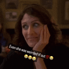 a woman with tears in her eyes and the words even she was weirded tf out 100