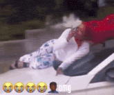 a woman is laying on the hood of a car with tears coming down her face