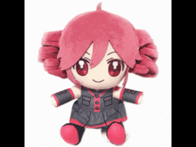 a stuffed toy of a girl with red hair is sitting on a white background
