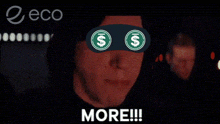 a man wearing a mask with dollar signs on his eyes screaming more