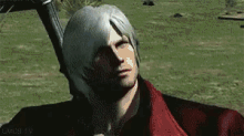 dante from devil may cry is holding a gun and looking at the camera .