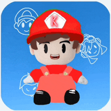 a stuffed toy with a red hat and a k on it