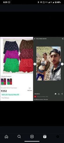 a phone screen shows a picture of a man and woman